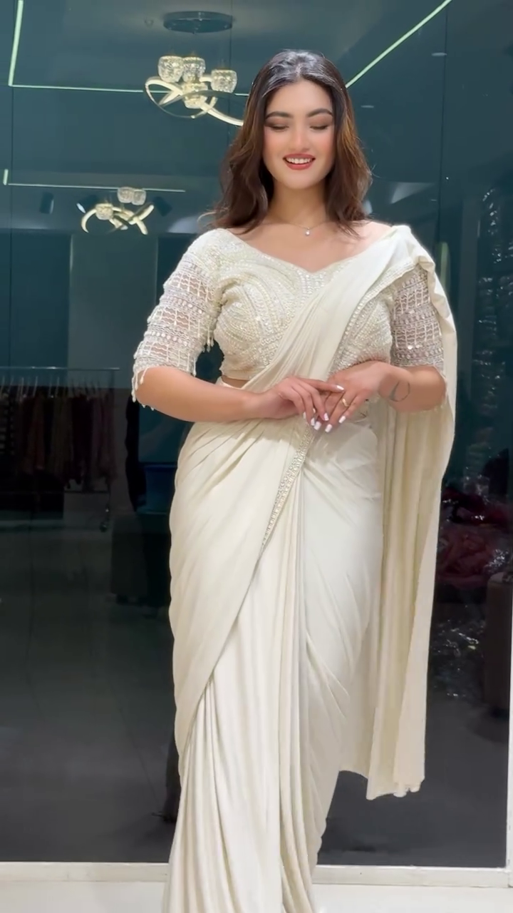 White Drape Saree with Pearl Embroidery – A Graceful Fusion of Elegance and Sophistication