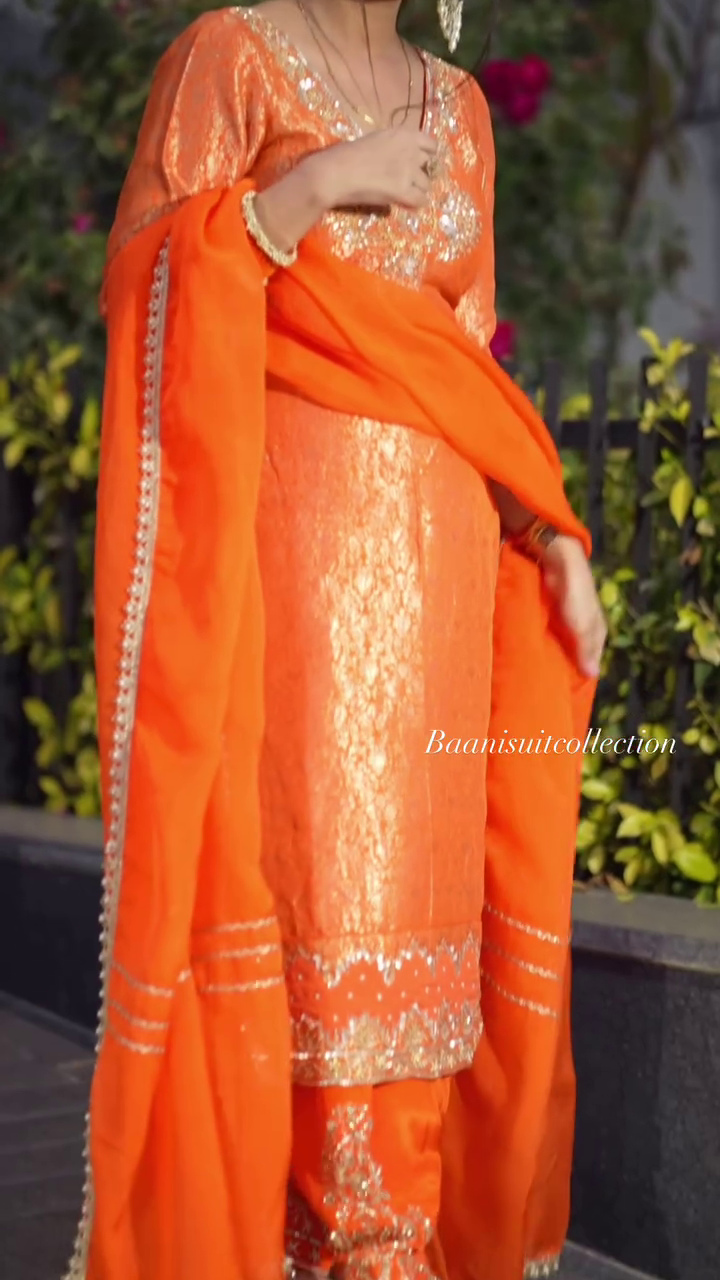 Exotic Orange Color Thread Work Top – A Bold and Elegant Addition to Your Wardrobe