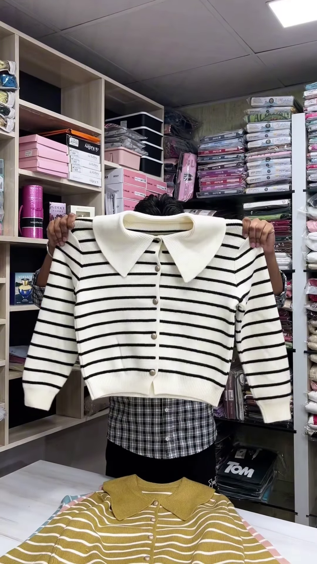 🧶 Collar & Contrast: Striped Button-Down Sweater Collection