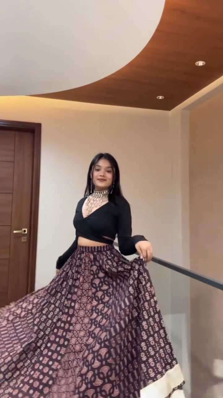 Black Crop Top with Printed Flared Skirt – Chic Fusion Look 🖤